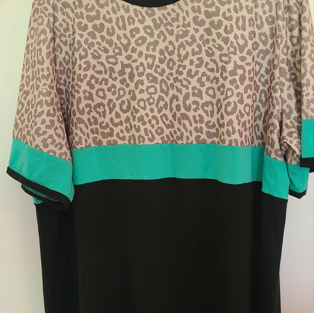 Nice blouse purchased from a local boutique. Size 3x, leopard, teal and black